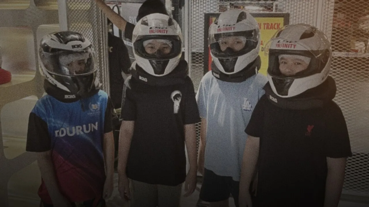 The friends as kids, in go-kart helmets